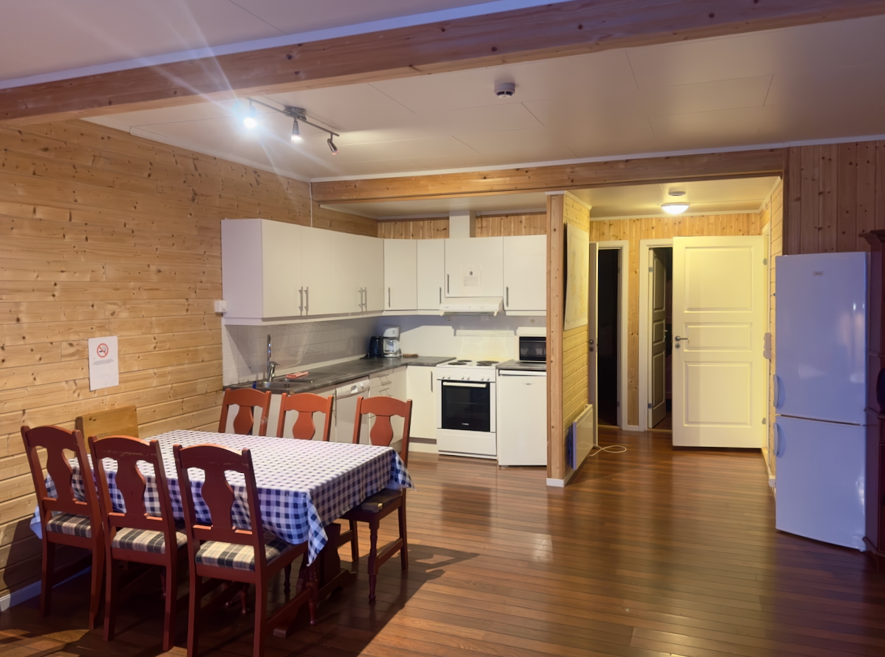 Cozy Hjelmsøy apartment with 2 bedrooms and 6 beds, featuring a modern kitchen and breathtaking fjord views.